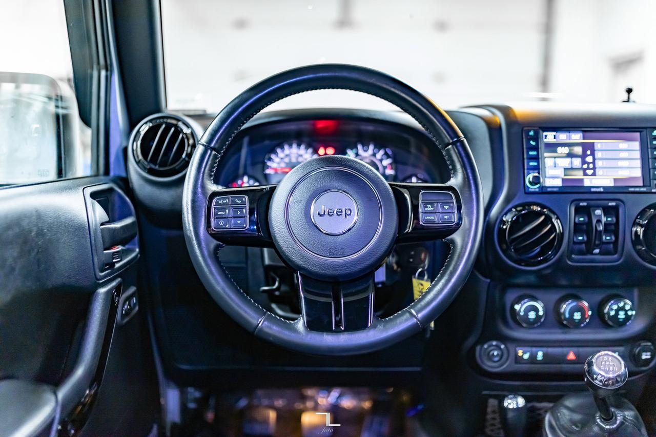 2017 Jeep Wrangler Unlimited 4x4 Sahara Winter Edition Leather Manual Red Deer AB