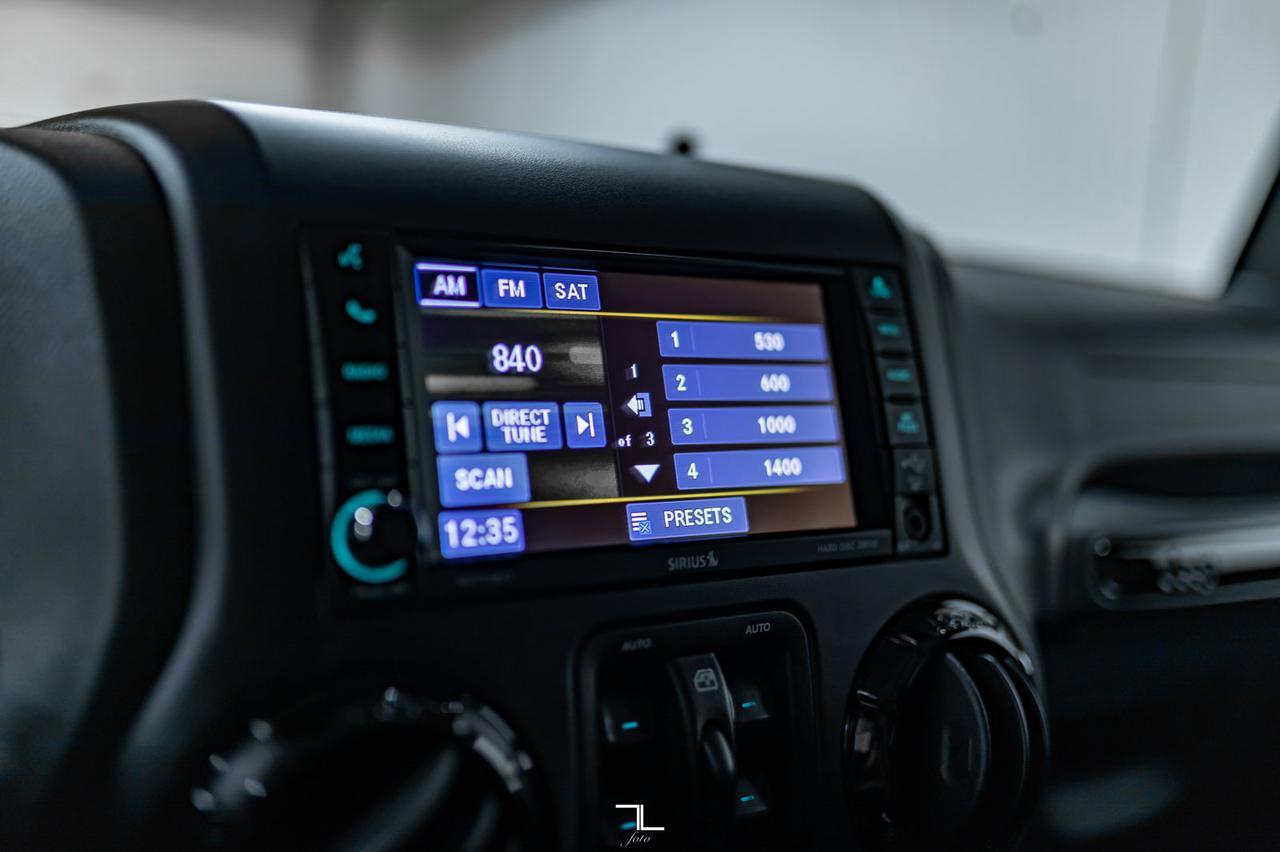 2017 Jeep Wrangler Unlimited 4x4 Sahara Winter Edition Leather Manual Red Deer AB