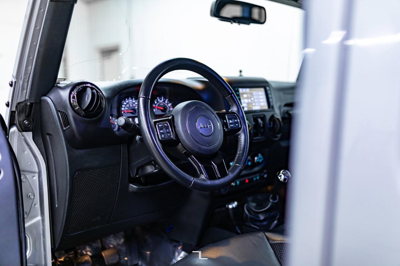 2017 Jeep Wrangler Unlimited 4x4 Sahara Winter Edition Leather Manual Red Deer AB