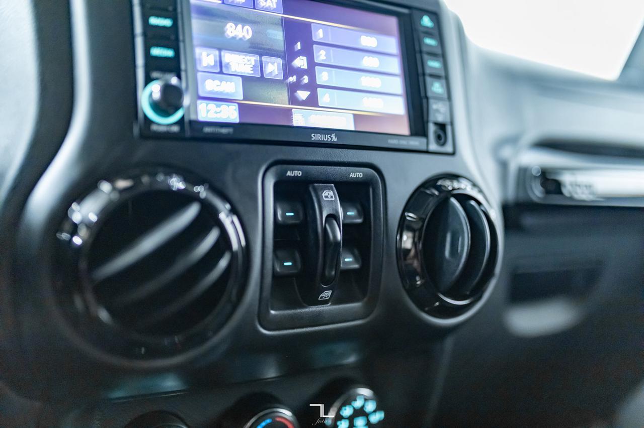 2017 Jeep Wrangler Unlimited 4x4 Sahara Winter Edition Leather Manual Red Deer AB