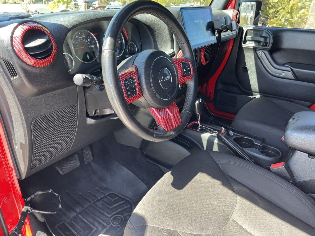 2017 Jeep Wrangler Unlimited WILLYS WHEELER~CLEAN CARFAX~WINCH~LIGHTBAR~AUXILIARY LIGHTS~LIFTED~ONLINE FINANCE AND SHIPPING AVAILABLE!!!!! Sarasota FL