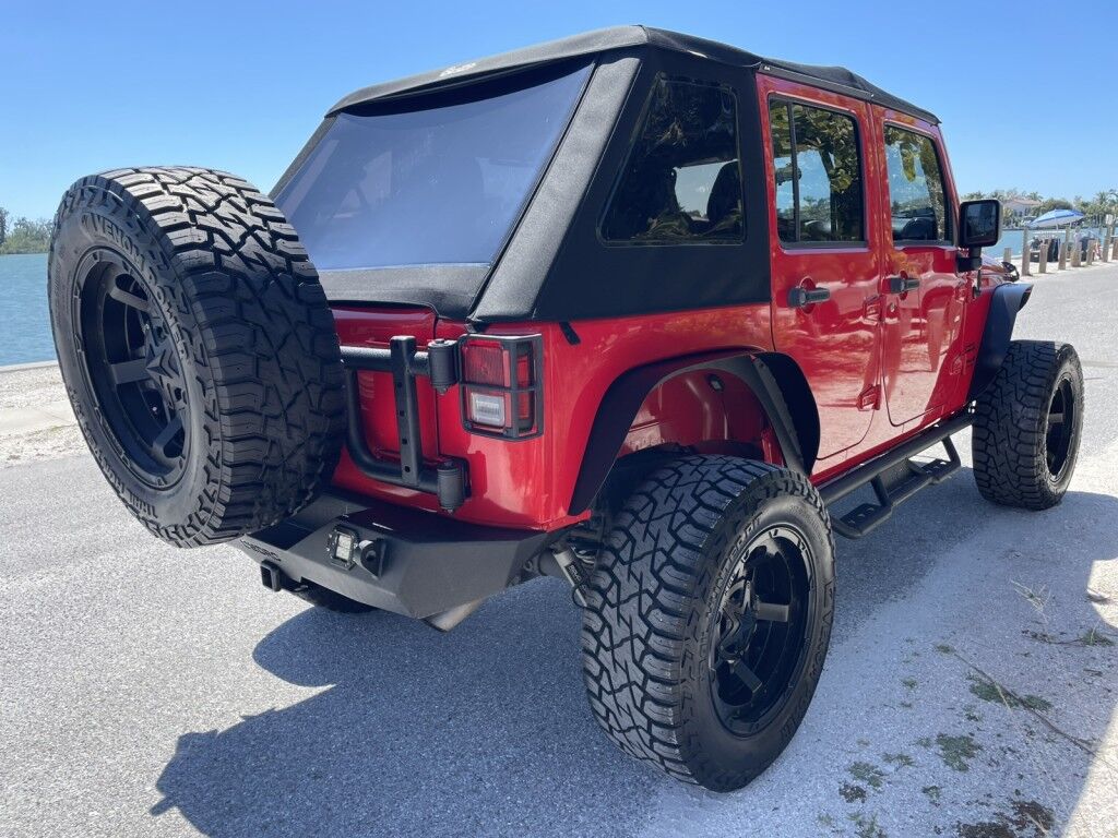 2017 Jeep Wrangler Unlimited WILLYS WHEELER~CLEAN CARFAX~WINCH~LIGHTBAR~AUXILIARY LIGHTS~LIFTED~ONLINE FINANCE AND SHIPPING AVAILABLE!!!!! Sarasota FL