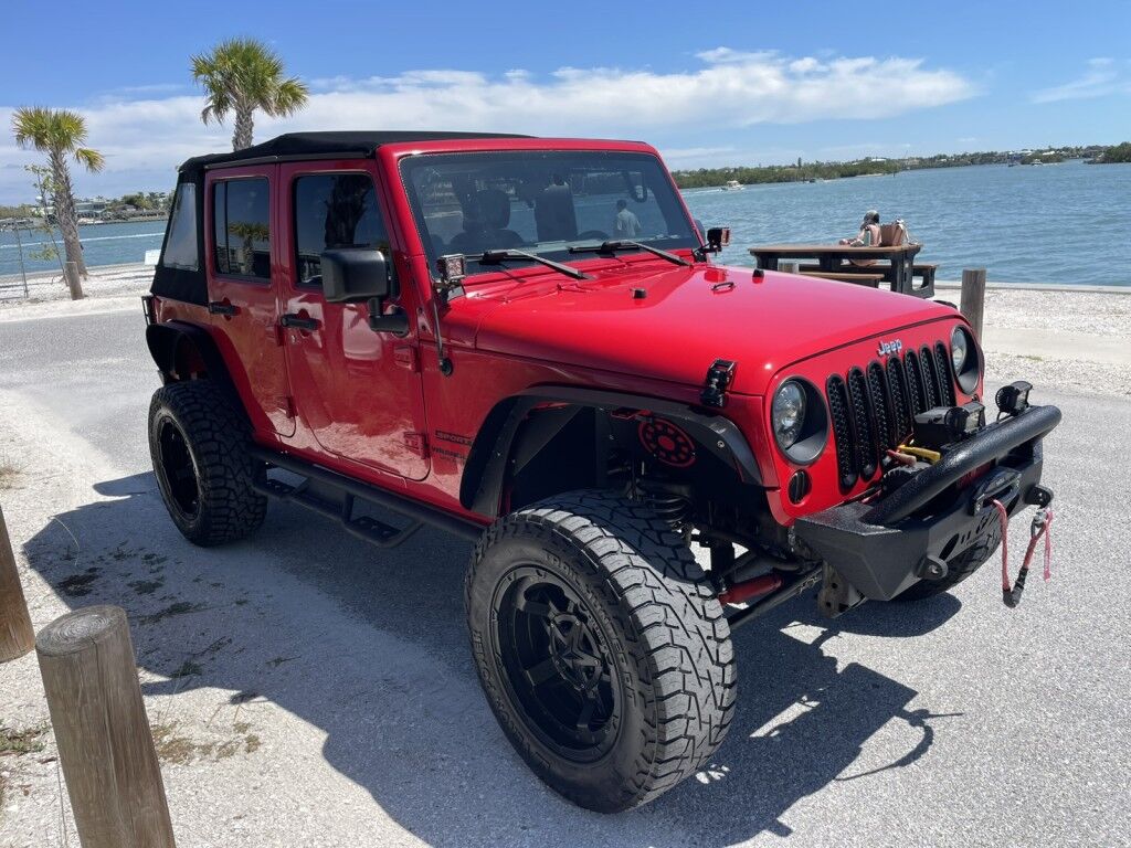 2017 Jeep Wrangler Unlimited WILLYS WHEELER~CLEAN CARFAX~WINCH~LIGHTBAR~AUXILIARY LIGHTS~LIFTED~ONLINE FINANCE AND SHIPPING AVAILABLE!!!!! Sarasota FL