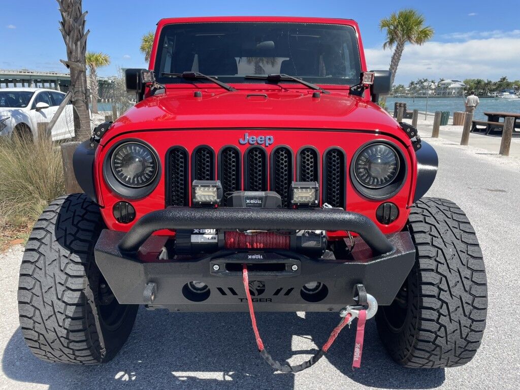 2017 Jeep Wrangler Unlimited WILLYS WHEELER~CLEAN CARFAX~WINCH~LIGHTBAR~AUXILIARY LIGHTS~LIFTED~ONLINE FINANCE AND SHIPPING AVAILABLE!!!!! Sarasota FL