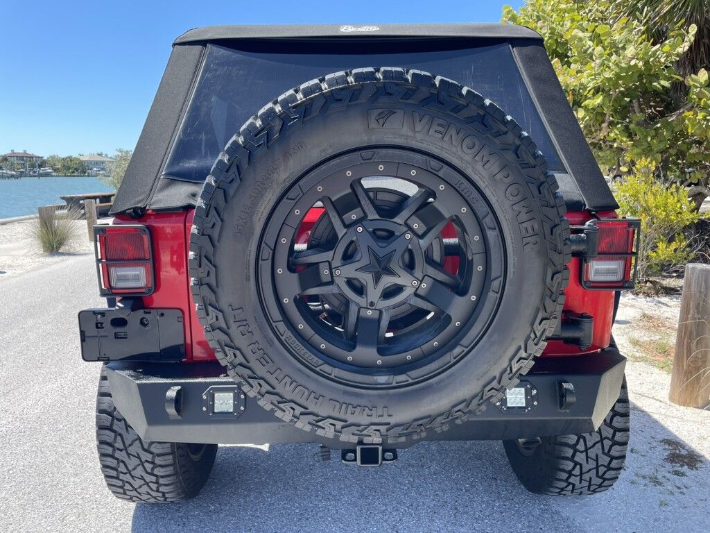 2017 Jeep Wrangler Unlimited WILLYS WHEELER~CLEAN CARFAX~WINCH~LIGHTBAR~AUXILIARY LIGHTS~LIFTED~ONLINE FINANCE AND SHIPPING AVAILABLE!!!!! Sarasota FL