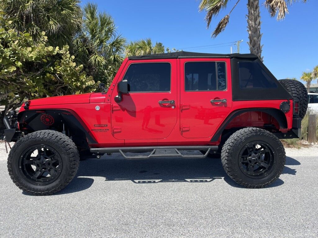 2017 Jeep Wrangler Unlimited WILLYS WHEELER~CLEAN CARFAX~WINCH~LIGHTBAR~AUXILIARY LIGHTS~LIFTED~ONLINE FINANCE AND SHIPPING AVAILABLE!!!!! Sarasota FL