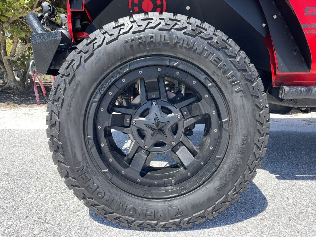 2017 Jeep Wrangler Unlimited WILLYS WHEELER~CLEAN CARFAX~WINCH~LIGHTBAR~AUXILIARY LIGHTS~LIFTED~ONLINE FINANCE AND SHIPPING AVAILABLE!!!!! Sarasota FL