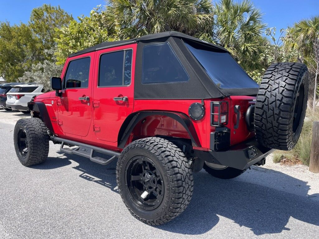 2017 Jeep Wrangler Unlimited WILLYS WHEELER~CLEAN CARFAX~WINCH~LIGHTBAR~AUXILIARY LIGHTS~LIFTED~ONLINE FINANCE AND SHIPPING AVAILABLE!!!!! Sarasota FL