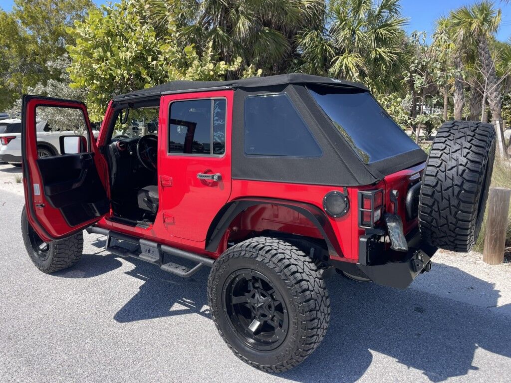 2017 Jeep Wrangler Unlimited WILLYS WHEELER~CLEAN CARFAX~WINCH~LIGHTBAR~AUXILIARY LIGHTS~LIFTED~ONLINE FINANCE AND SHIPPING AVAILABLE!!!!! Sarasota FL