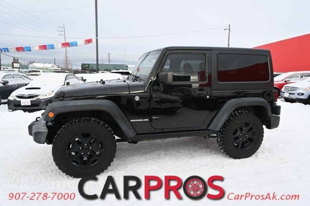 2017 Jeep Wrangler Willys Wheeler Edition - 4X4 - 3.6L V6 - 6 Spd Manual - Power Door Locks, Windows & Mirrors - Keyless Entry - Tinted Windows - 3 piece Hard Top - LED Lighting - Tow Package - Only 65K Miles Anchorage AK