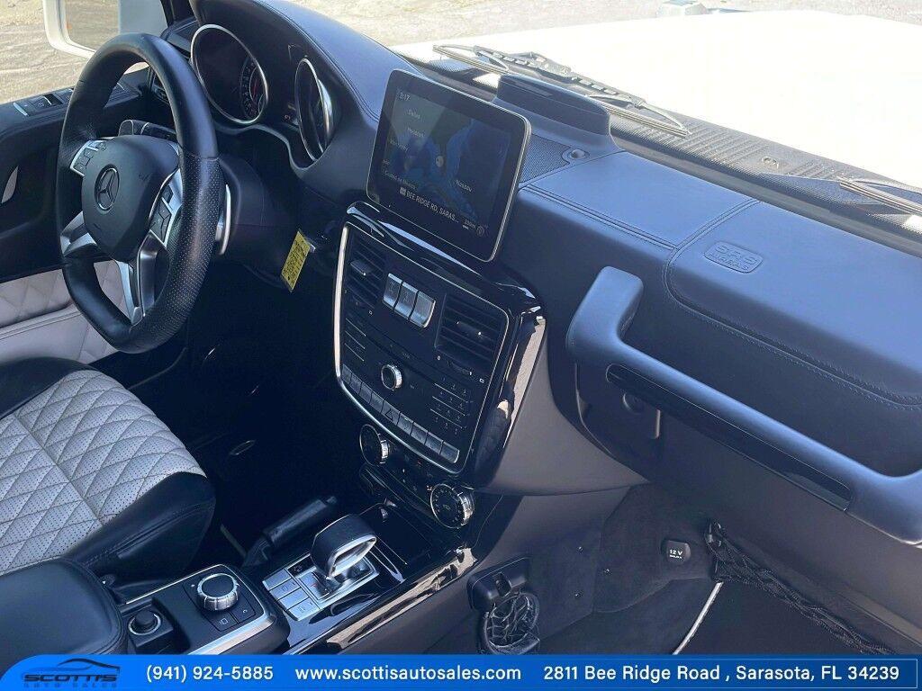 2017 Mercedes-Benz G-Class AMG G 63~ACCIDENT AVOIDANCE SYSTEMS~ADJ LUMBAR SUPPORT~APPROACH LIGHTS~AUTO START/STOP~CRASH SENSORS~FULL SIZE SPARE TIRE~HEATED SEATS~MOONROOF/ SUNROOF~PREMIUM LEATHER SEATS~RUNNING BOARDS~TURBOCHARGER~LOW MILES Sarasota FL