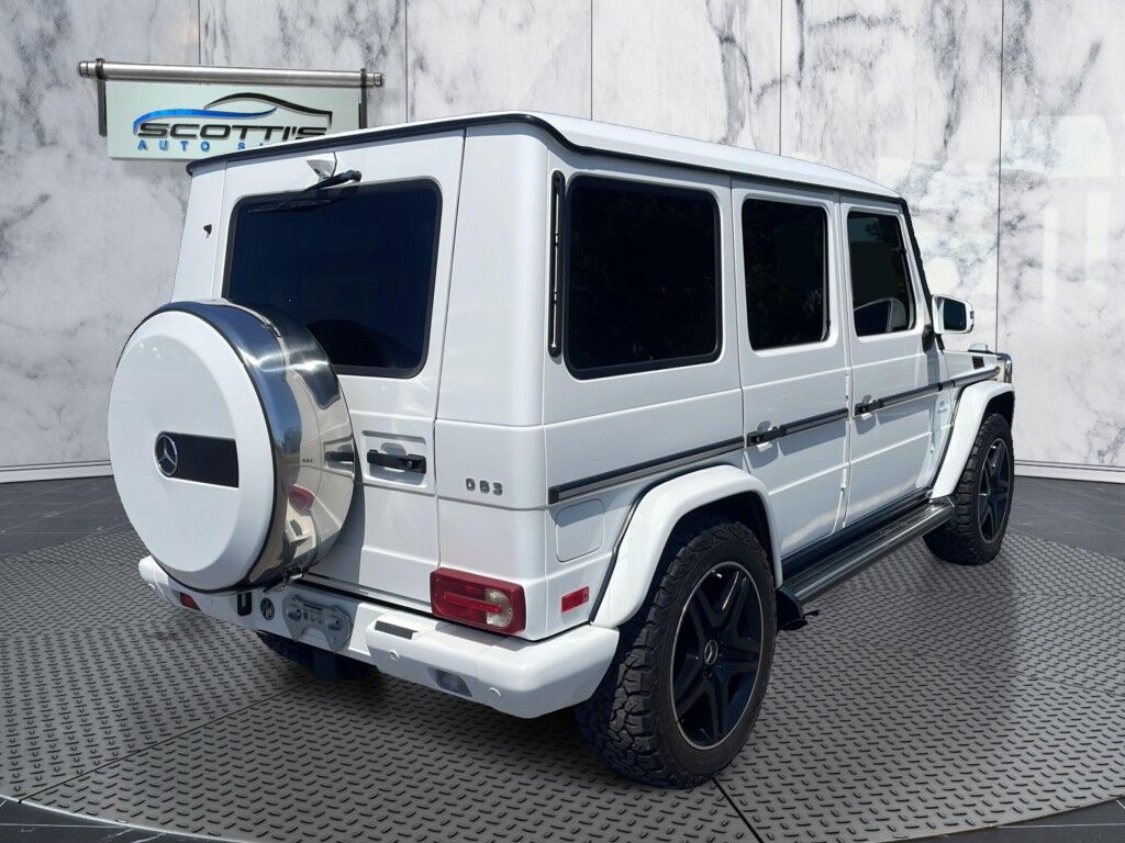 2017 Mercedes-Benz G-Class AMG G 63~ACCIDENT AVOIDANCE SYSTEMS~ADJ LUMBAR SUPPORT~APPROACH LIGHTS~AUTO START/STOP~CRASH SENSORS~FULL SIZE SPARE TIRE~HEATED SEATS~MOONROOF/ SUNROOF~PREMIUM LEATHER SEATS~RUNNING BOARDS~TURBOCHARGER~LOW MILES Sarasota FL