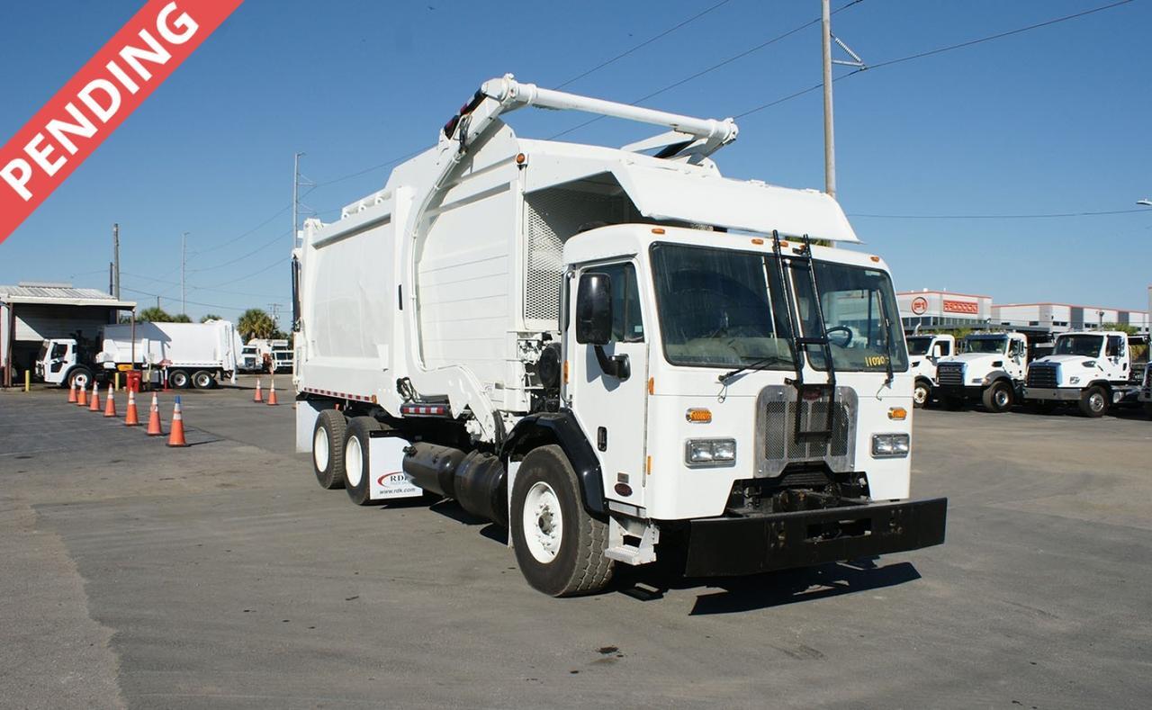 2017 Peterbilt 320 40 Yard Heil Front Loader