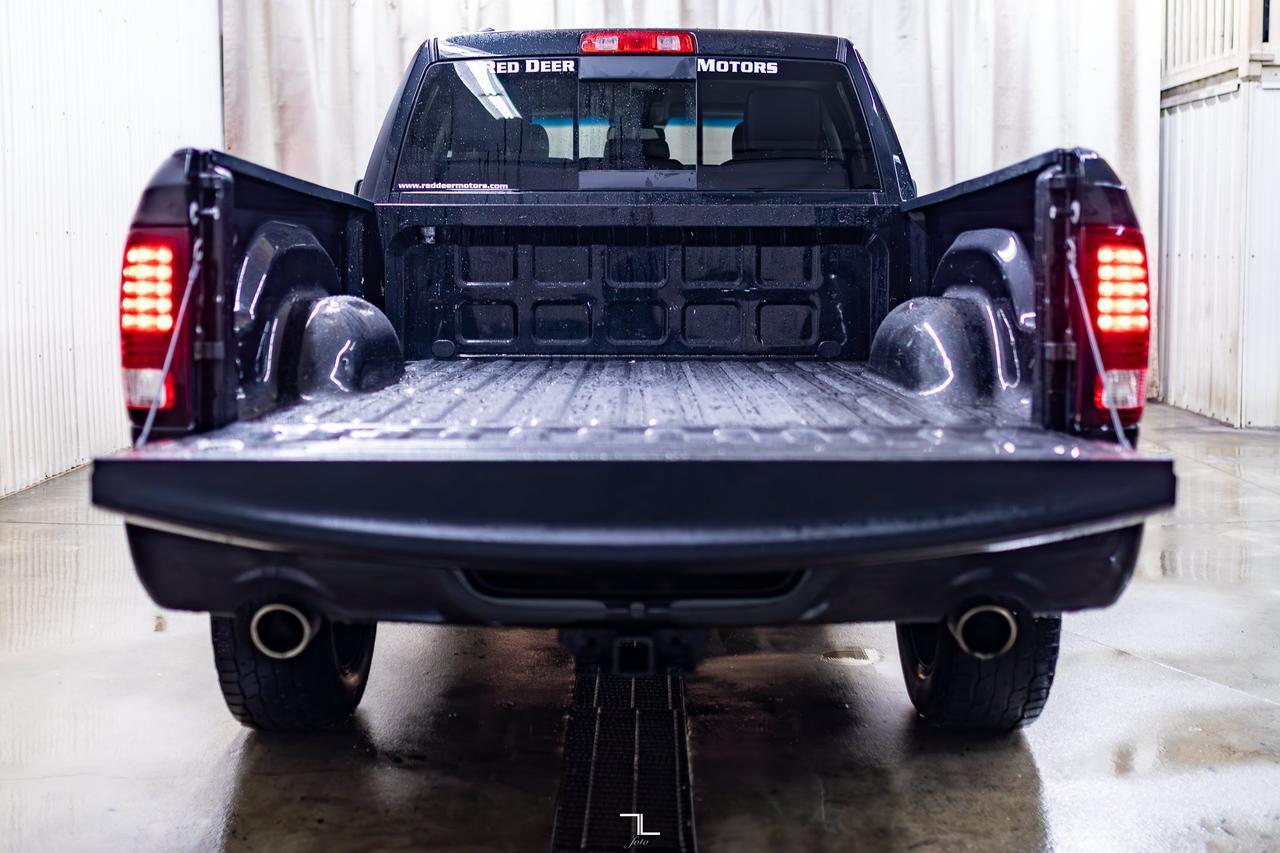 2017 Ram 1500 4x4 Quad Cab Sport PSeat Red Deer AB