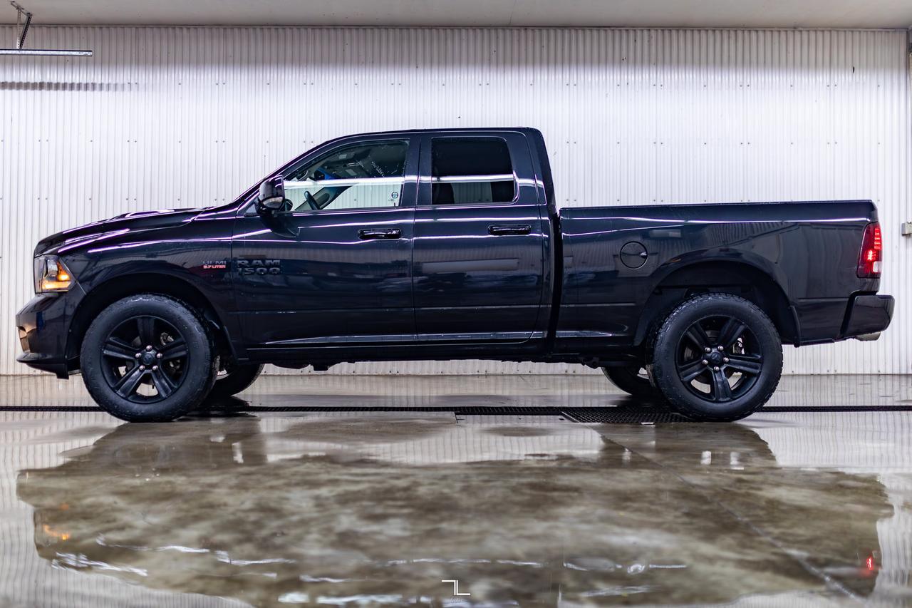 2017 Ram 1500 4x4 Quad Cab Sport PSeat Red Deer AB