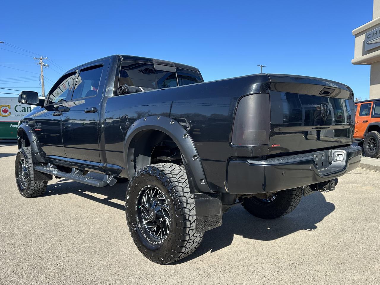 2017 Ram 2500 Laramie Crew Cab 4x4 | DELETED & TUNED | 6" Lift | Heated & Cooled Seats | Sun Roof | Alpine Audio Redwater AB
