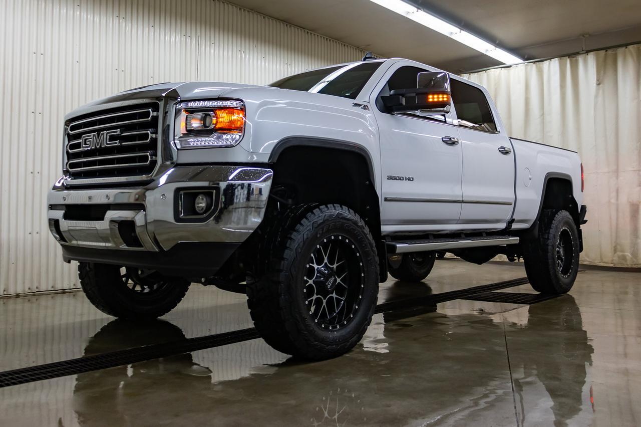 2019 GMC Sierra 3500HD 4x4 Crew Cab SLT Z71 Diesel 6" Lift Leather Roof Nav Red Deer AB
