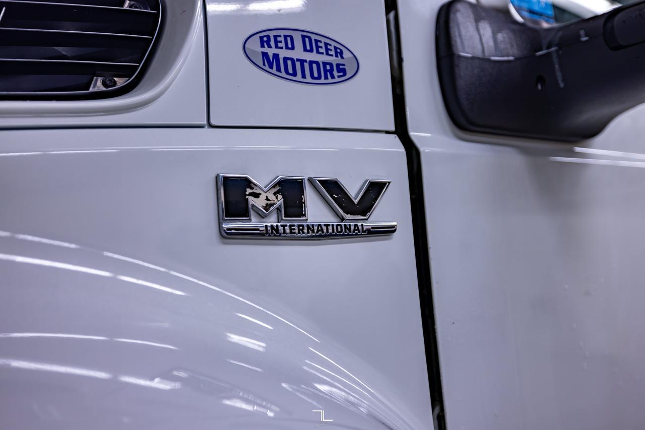 2019 International MV607 Daycab Roll Off Deck Diesel Red Deer AB