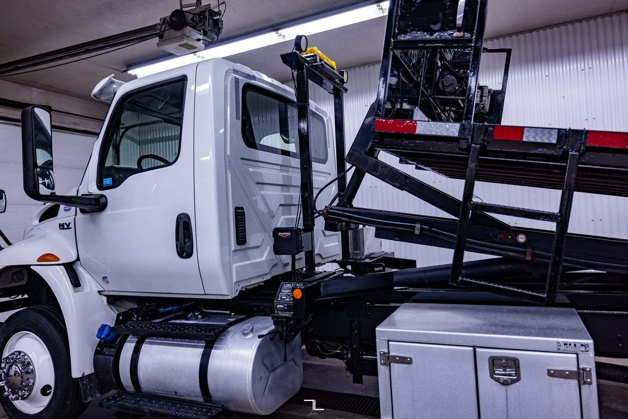 2019 International MV607 Daycab Roll Off Deck Diesel Red Deer AB