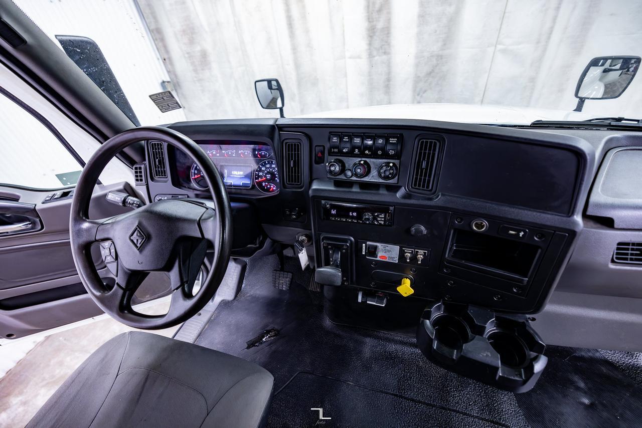 2019 International MV607 Daycab Roll Off Deck Diesel Red Deer AB