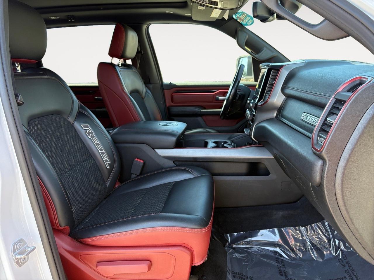 2019 Ram 1500 Rebel, BLIND SPOT ALERT, BLACK TUBULAR SIDE STEPS, REMOTE START, BACKUP CAMERA WITH PARKING SENSORS, PANORAMIC SUNROOF, APPLE CARPLAY/ANDROID AUTO, CLEAN CARFAX, BECOME A REBEL ON THE ROAD!