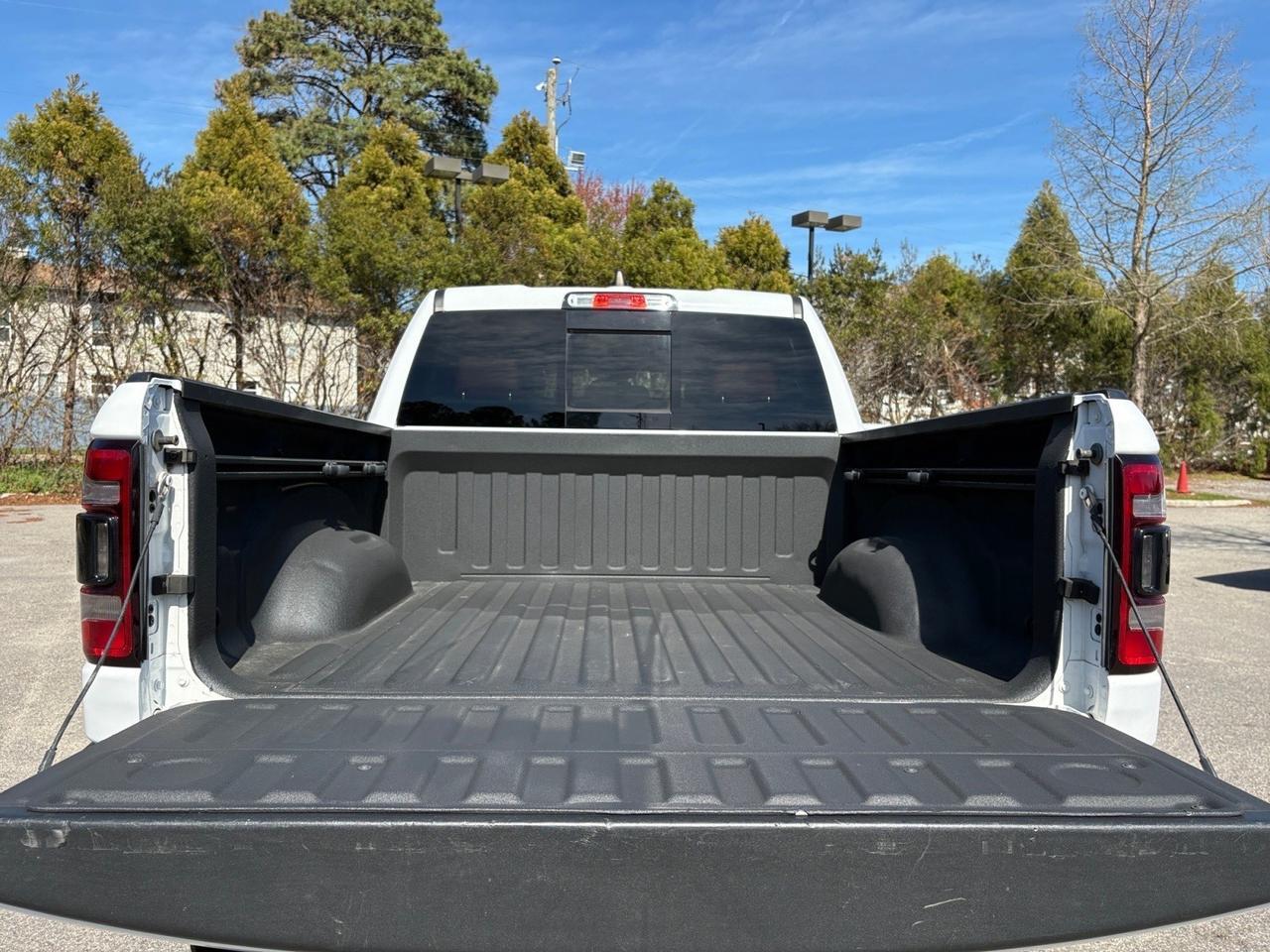 2019 Ram 1500 Rebel, BLIND SPOT ALERT, BLACK TUBULAR SIDE STEPS, REMOTE START, BACKUP CAMERA WITH PARKING SENSORS, PANORAMIC SUNROOF, APPLE CARPLAY/ANDROID AUTO, CLEAN CARFAX, BECOME A REBEL ON THE ROAD! Virginia Beach VA