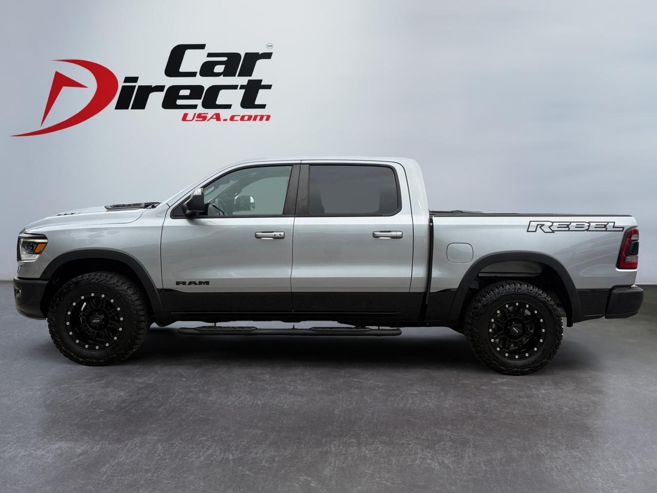 2019 Ram 1500 Rebel, CUSTOM PRO COMP WHEELS, RUNNING BOARDS, TOW PACKAGE, BACKUP CAMERA, LANE KEEP ASSIST, BLIND SPOT ALERT, HEATED SEATS, HEATED STEERING WHEEL, APPLE CARPLAY/ANDROID AUTO, LOW MILES, CLEAN CARFAX, RULE THE ROAD IN A REBEL!
