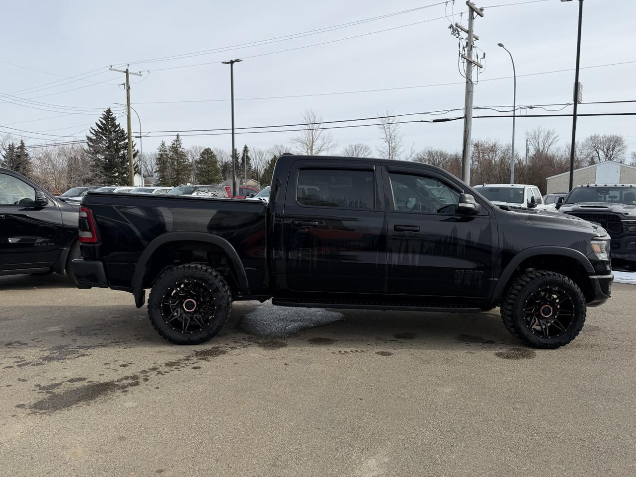 2019 Ram 1500 Rebel Crew Cab 4x4 | NAV | 12IN Display | Leather | Heated Seats | Remote Start | OffRoad Suspension Redwater AB