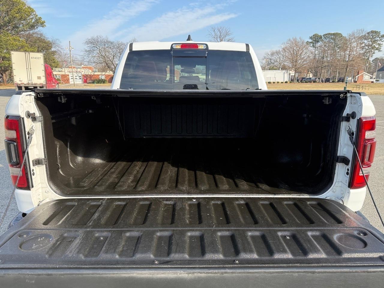 2019 Ram 1500 Rebel, HEATED SEATS, HEATED STEERING WHEEL, MOONROOF, APPLE CARPLAY/ANDROID AUTO, BED LINER, POWER FOLDING MIRRORS, TONNEAU COVER, BACKUP CAMERA, POWER SLIDING REAR WINDOW, UNIVERSAL GARAGE DOOR OPENER, RUNNING BOARDS, THIS RAM IS READY TO TAKE ON AN Norfolk VA