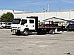 2020 Mitsubishi Fuso FE160GAS Crew Cab 15' BABCO steel flatbed Truck with 3,300lb. Lift Gate