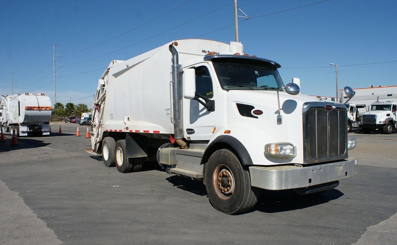 2020 Peterbilt 567 25 yard Mcneilus Rear Loader Garbage Truck