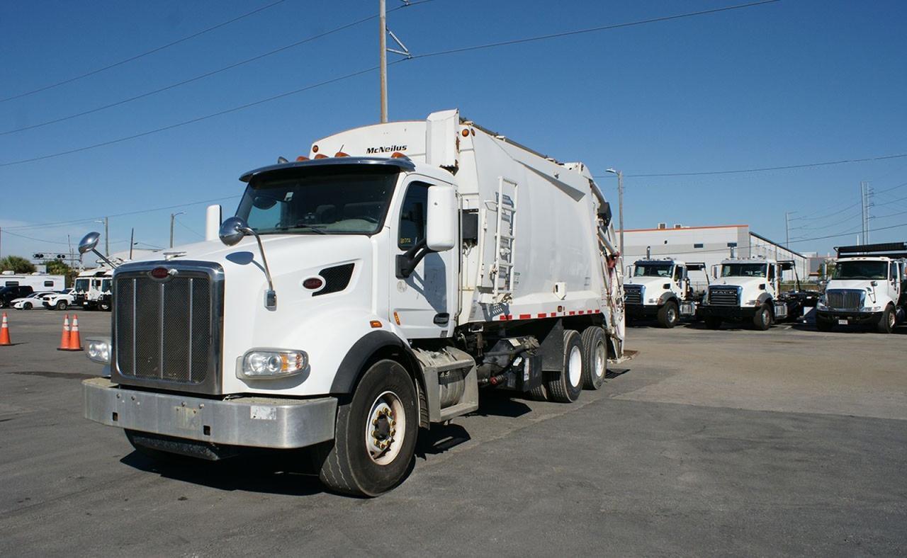 2020 Peterbilt 567 25 yard Mcneilus Rear Loader Garbage Truck