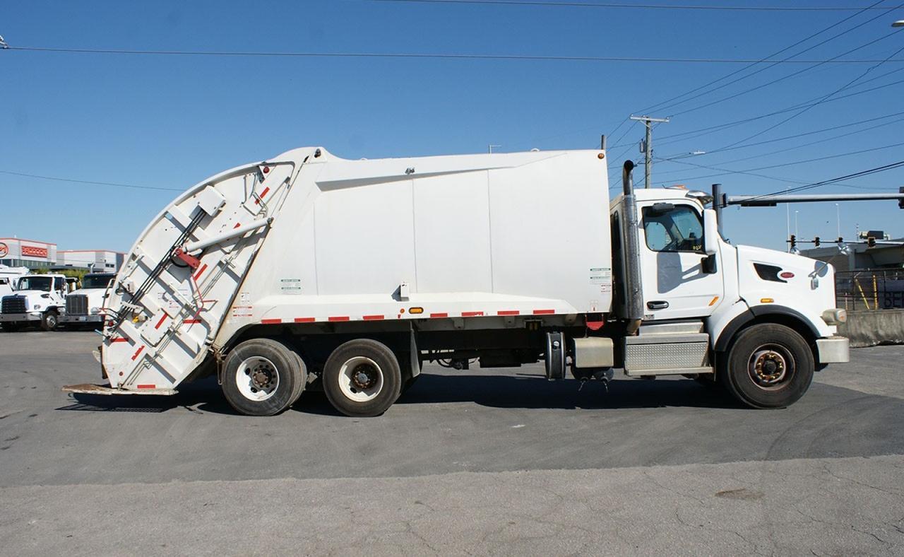 2020 Peterbilt 567 25 yard Mcneilus Rear Loader Garbage Truck