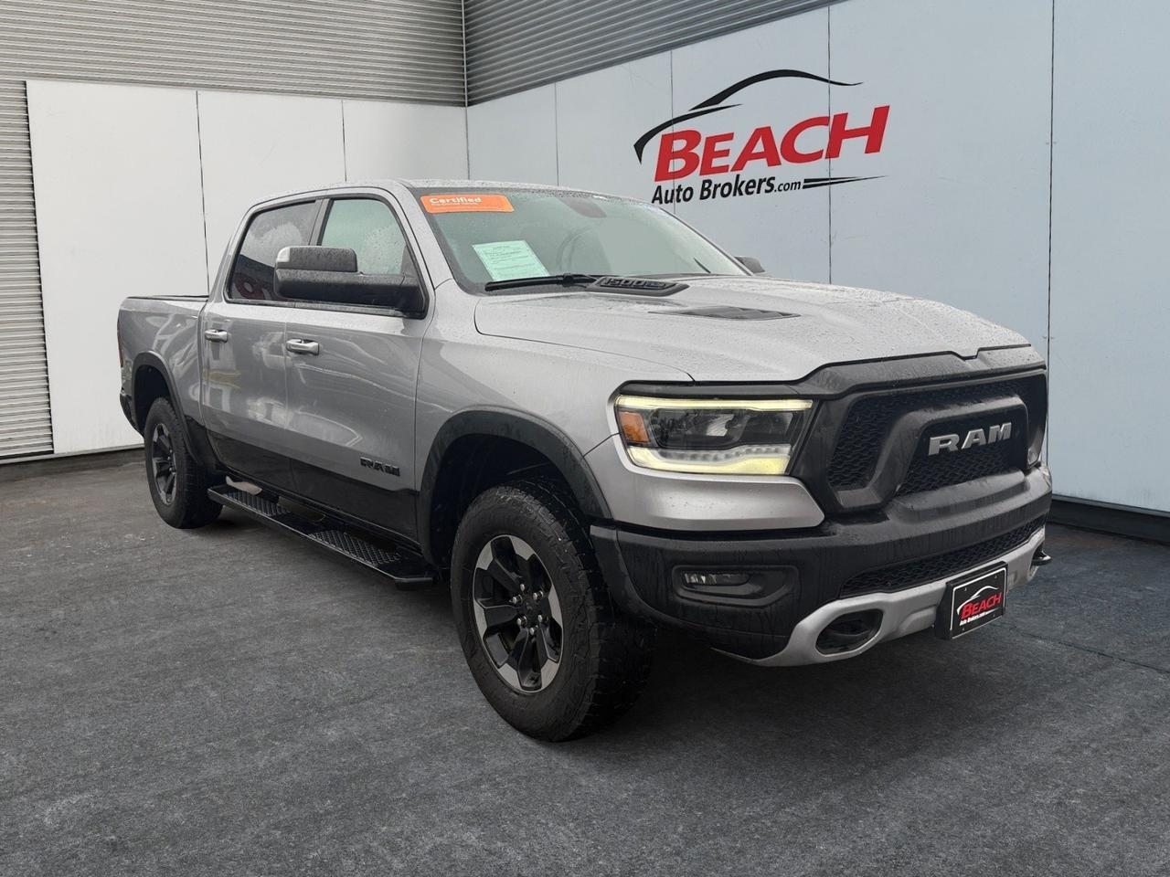 2020 Ram 1500 Rebel, RUNNING BOARDS, UNIVERSAL GARAGE DOOR OPENER, TOW HOOKS,POWER FOLDING MIRRORS, REAR POWER SLIDING WINDOW, BACKUP CAMERA, APPLE CARPLAY/ANDROID AUTO, HEATED FRONT SEATS, BED LINER, COME AND CHECK OUT THIS RAM REBEL TODAY!