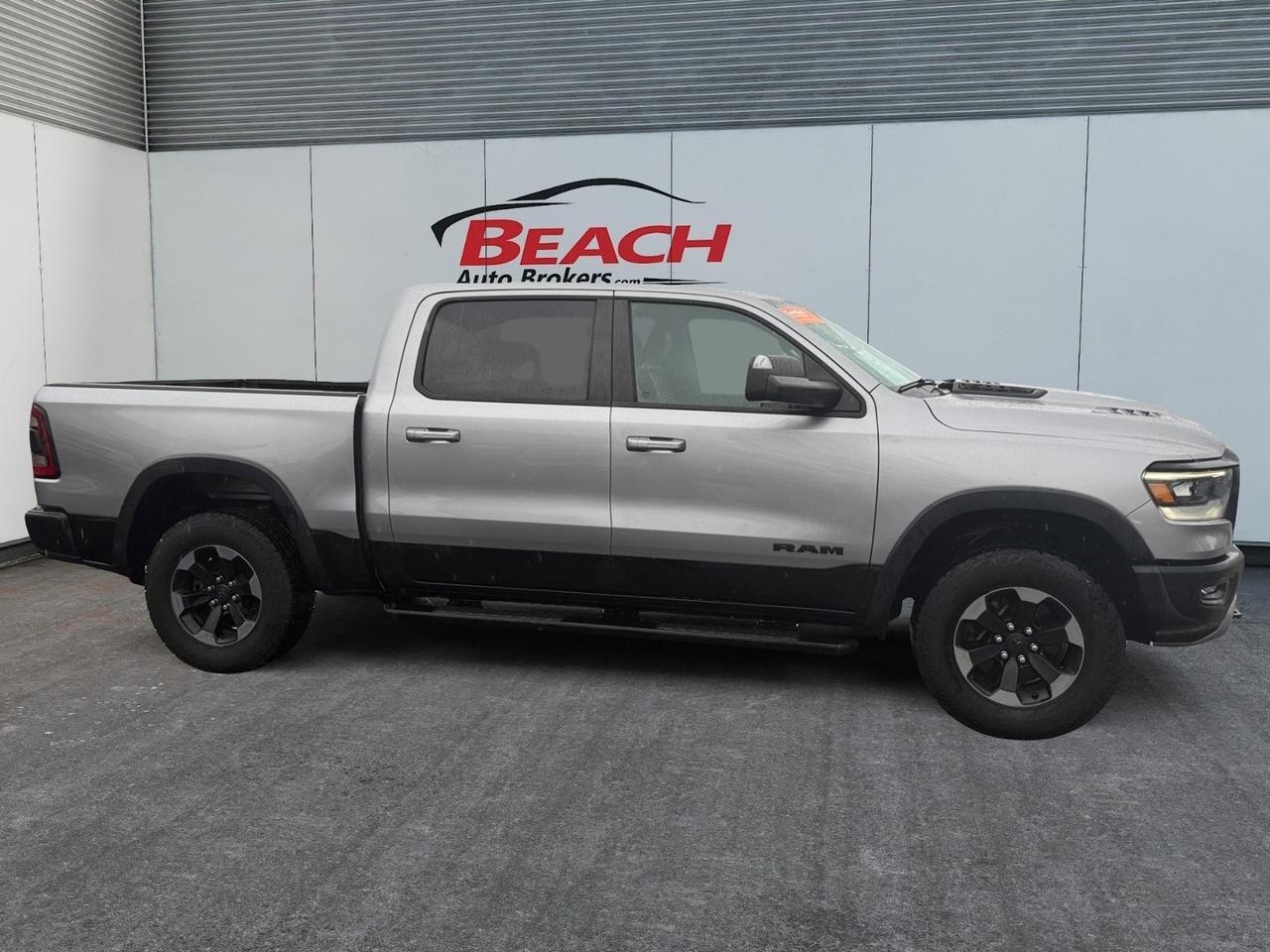 2020 Ram 1500 Rebel, RUNNING BOARDS, UNIVERSAL GARAGE DOOR OPENER, TOW HOOKS,POWER FOLDING MIRRORS, REAR POWER SLIDING WINDOW, BACKUP CAMERA, APPLE CARPLAY/ANDROID AUTO, HEATED FRONT SEATS, BED LINER, COME AND CHECK OUT THIS RAM REBEL TODAY! Norfolk VA