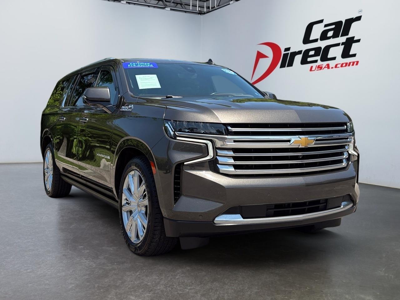 2021 Chevrolet Suburban High Country, HEADS-UP DISPLAY, POWER RUNNING BOARDS, POWER LIFTGATE, BLIND SPOT ALERT, LANE KEEP ASSIST, PANORAMIC MOONROOF, APPLE CARPLAY/ANDROID AUTO, 360 BACKUP CAMERA, HEATED & COOLING SEATS, REAR DVD ENTERTAINMENT, LOW MILES, THIS SUV HAS IT AL