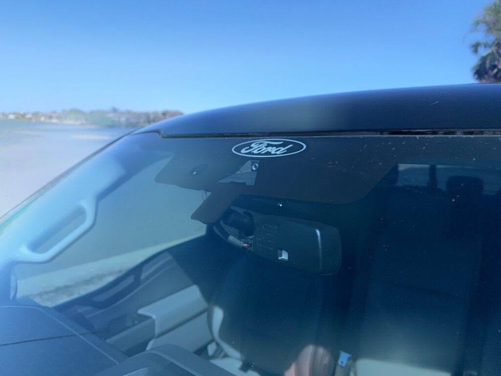 2021 Ford F-150 LARIAT~POWERBOOST HYBRID~DRIVER ASSIST~CARPLAY~CONNECTED CAR INTEGRATED APPS~ ECOBOOST~FX4 PACKAGE~LEATHER SEATS~REMOTE ENGINE START~TOW/HAUL MODE~ONLINE FINANCE AND SHIPPING AVAILABLE Sarasota FL
