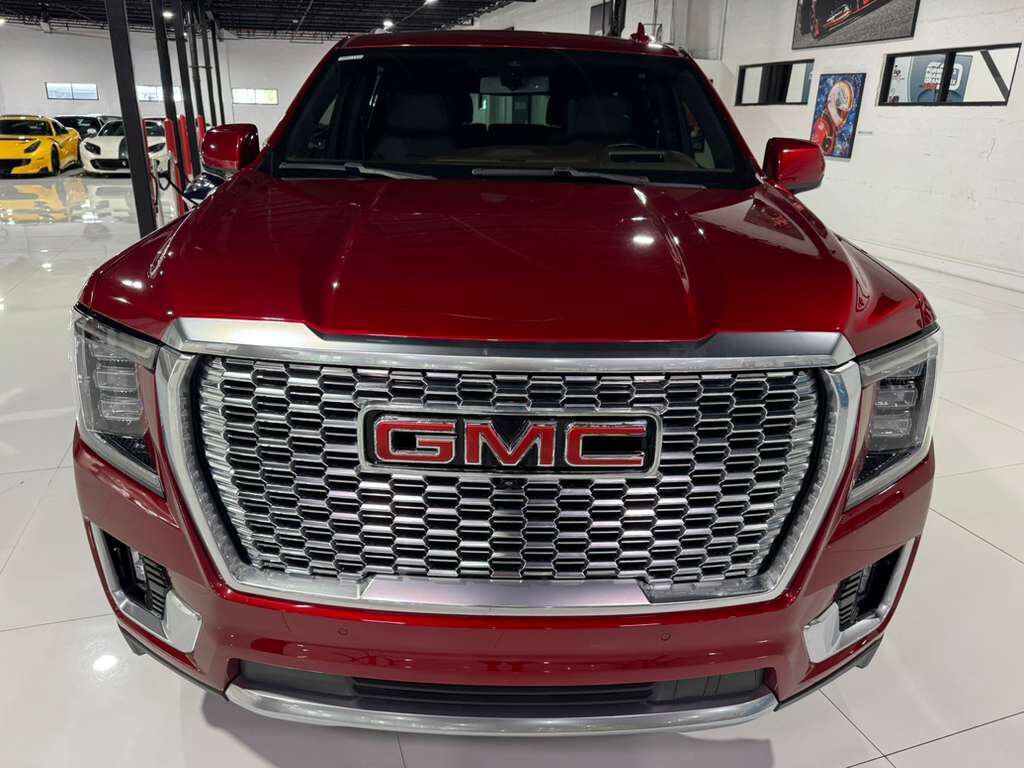 2021 GMC Yukon XL Denali Cayenne Red paint, Jet Black interior, rear entertainment system, Bose audio system AND MORE!
