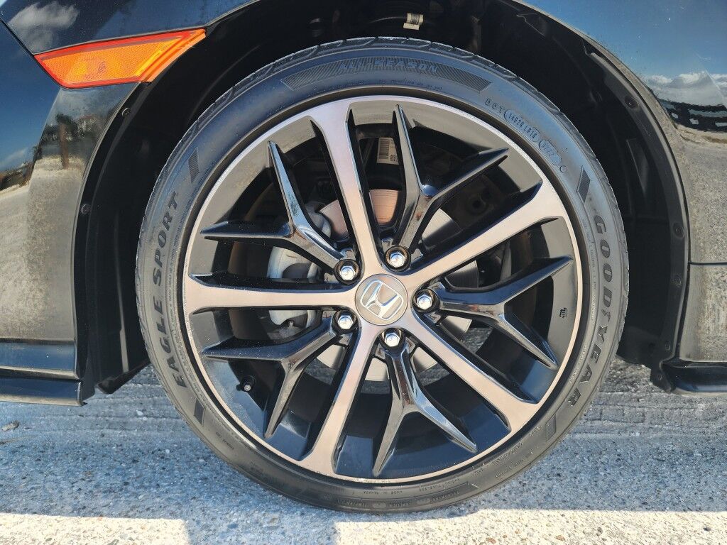 2021 Honda Civic Hatchback Sport~LOW MILES~ADAPTIVE CRUISE CONTROL~APPROACH LIGHTS~BLUETOOTH~DRIVER ASSISTANCE PACKAGE~HALOGEN HEADLIGHTS~SUPERCHARGER~TURBOCHARGER Sarasota FL