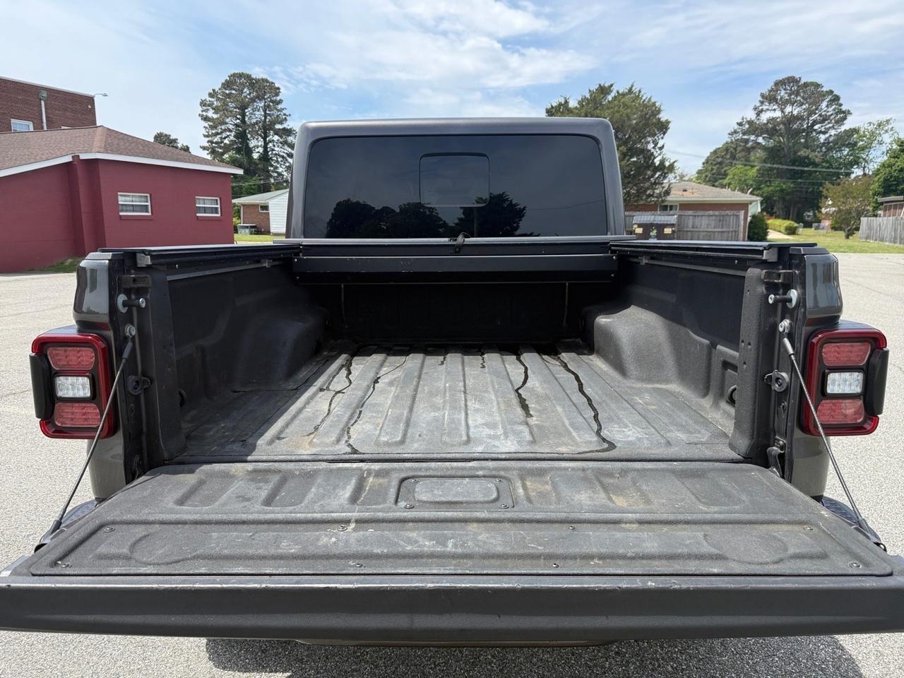 2021 Jeep Gladiator High Altitude, HEATED SEATS, APPLE CARPLAY/ANDROID AUTO, UNIVERSAL GARAGE DOOR OPENER, BED LINER, SLIDING REAR WINDOW, BACKUP CAMERA, POWER/HEATED MIRRORS, REMOTE START, CLEAN CARFAX! Norfolk VA