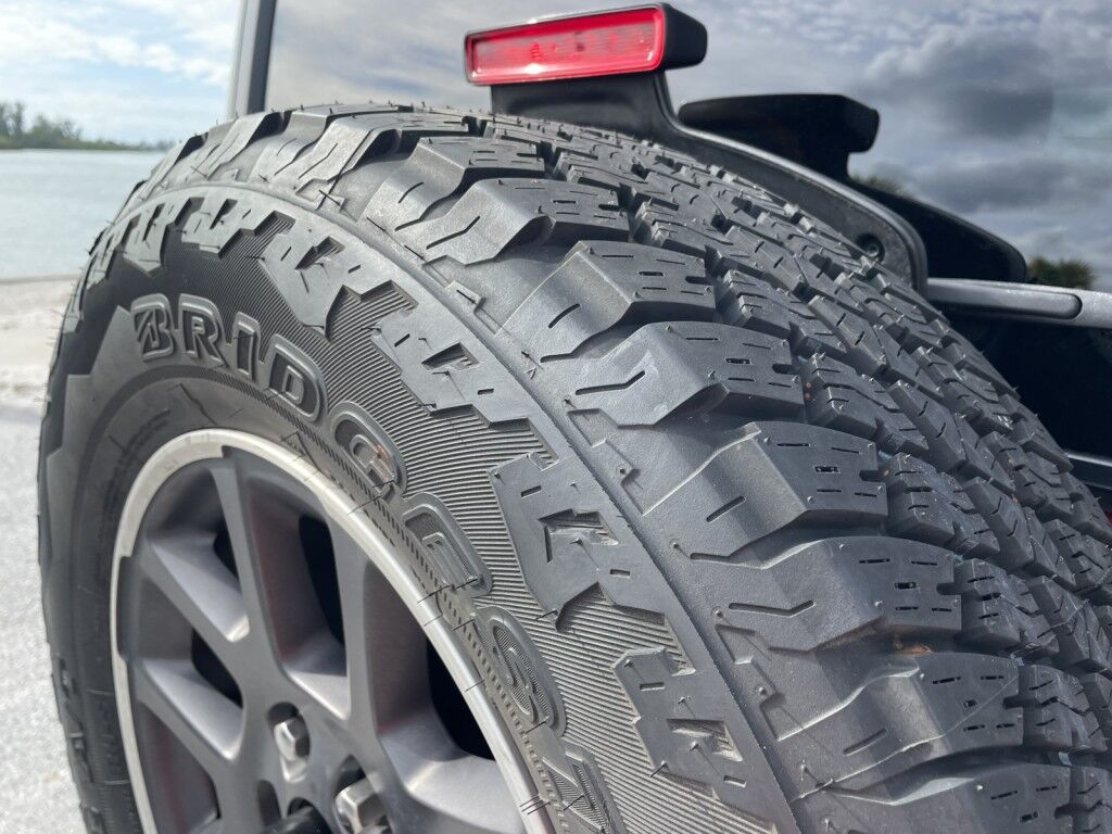 2021 Jeep Wrangler EXCELLENT CONDITION~4X4~CRUISE CONTROL~DRIVER ASSISTANCE PACKAGE~NAVIGATION~PREMIUM SOUND SYSTEM~UNLIMITED SPORT~REMOVABLE HARD TOP~TOW HOOKS Sarasota FL