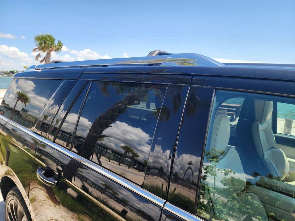 2021 Lincoln Navigator L~4X4~ACCIDENT AVOIDANCE SYSTEMS~ADAPTIVE CRUISE CONTROL~AUTO START/STOP~CAMERA WASHER~ECOBOOST~KEYLESS ENTRY~REAR CLIMATE CONTROLS~RUNNING BOARDS~TOW HOOKS~Wi-Fi COMPATIBLE Black Label Sarasota FL