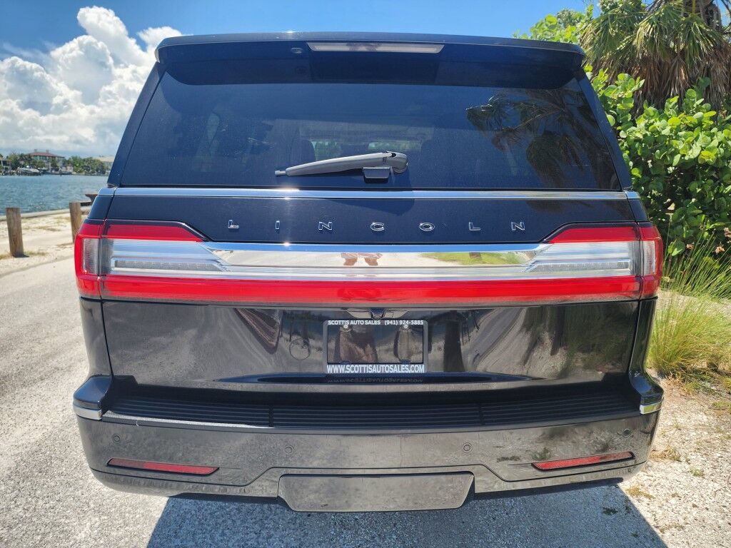 2021 Lincoln Navigator L~4X4~ACCIDENT AVOIDANCE SYSTEMS~ADAPTIVE CRUISE CONTROL~AUTO START/STOP~CAMERA WASHER~ECOBOOST~KEYLESS ENTRY~REAR CLIMATE CONTROLS~RUNNING BOARDS~TOW HOOKS~Wi-Fi COMPATIBLE Black Label Sarasota FL