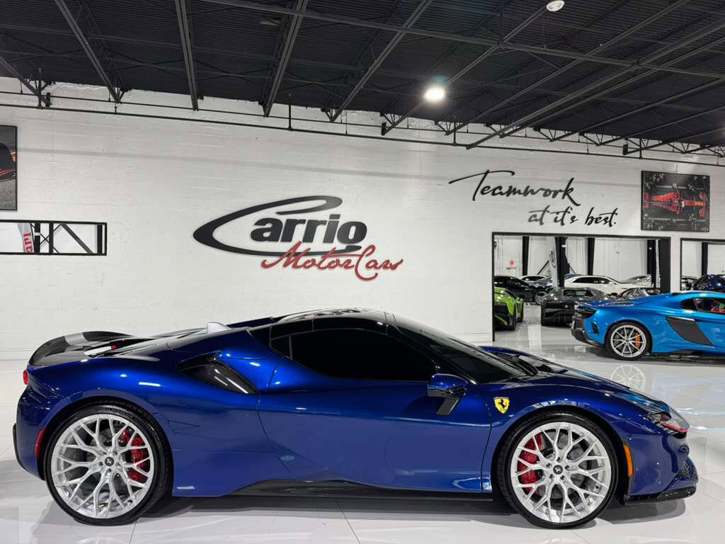 2022 Ferrari SF90 Spider Blu Elettrico paint,painted livrea,carbon racing seats,JBL audio,Apple CarPlay,carbon galore & MORE! Fort Lauderdale FL