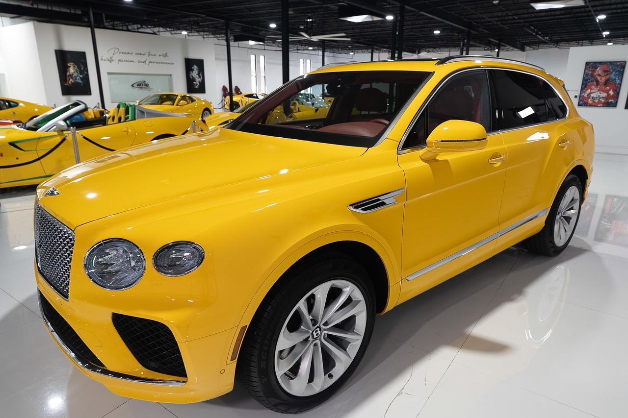 2023 Bentley Bentayga Azure Monaco Yellow paint, bespoke leather interior, four-passenger configuration AND MUCH MORE!!