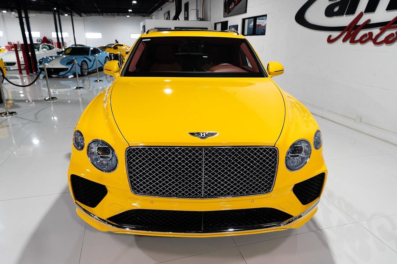 2023 Bentley Bentayga Azure Monaco Yellow paint, bespoke leather interior, four-passenger configuration AND MUCH MORE!!