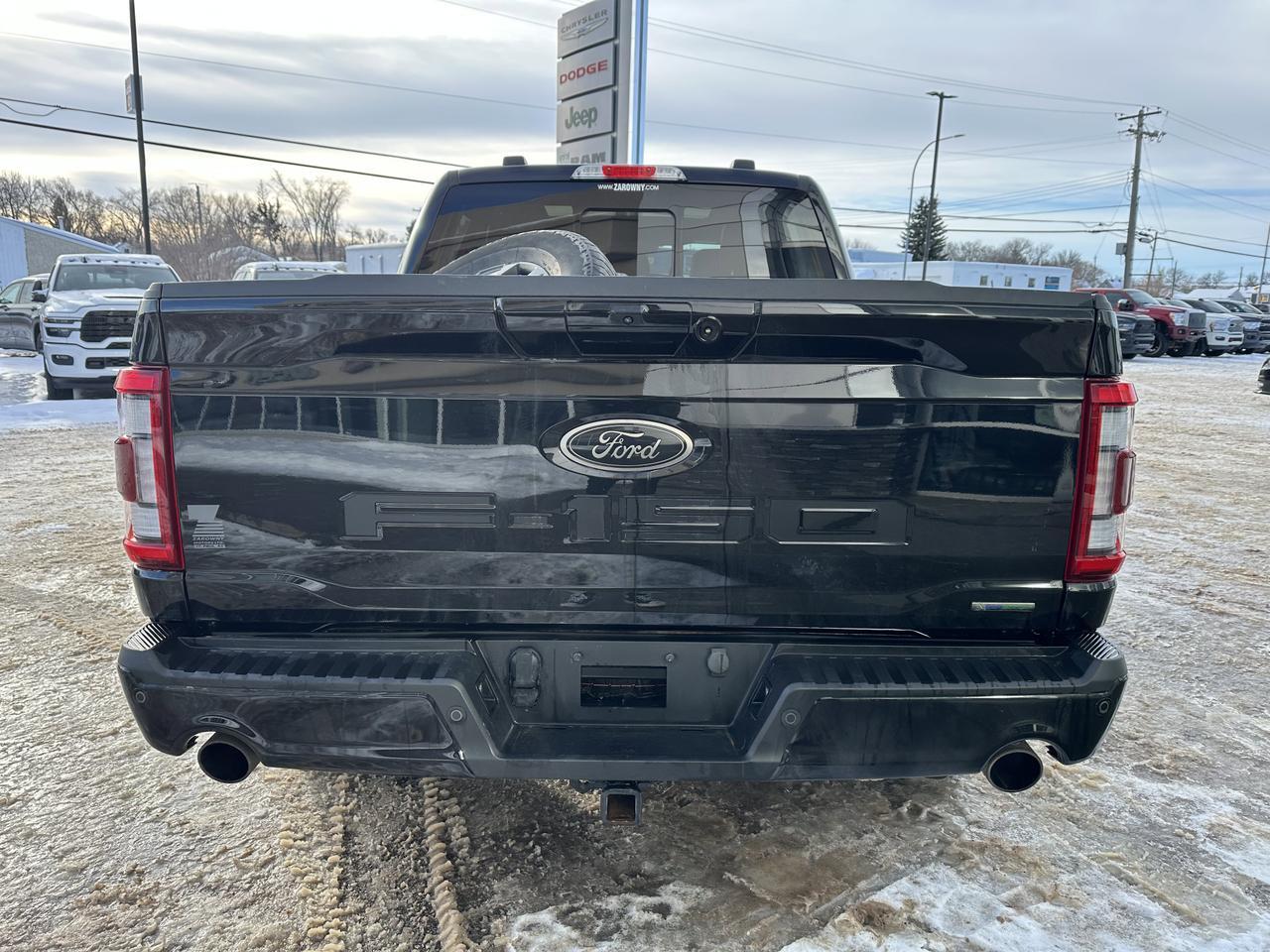 2023 Ford F-150 LARIAT 4WD | 502a | Sport Pkg | Pano Roof | Trailer Tow Pkg | 136L Tank | Black Pkg | 2 Sets Rims Redwater AB