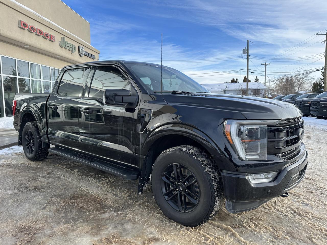 2023 Ford F-150 LARIAT 4WD | 502a | Sport Pkg | Pano Roof | Trailer Tow Pkg | 136L Tank | Black Pkg | 2 Sets Rims Redwater AB