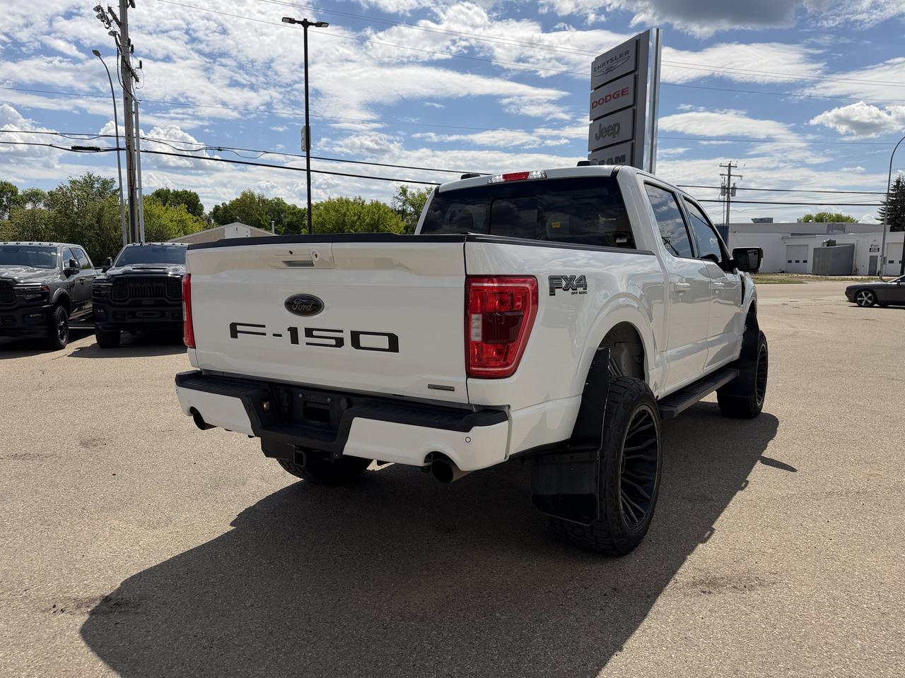 2023 Ford F-150 XLT Black Appearance PKG l Crew l 4x4 l Leather l Panoroof l Lifted Redwater AB