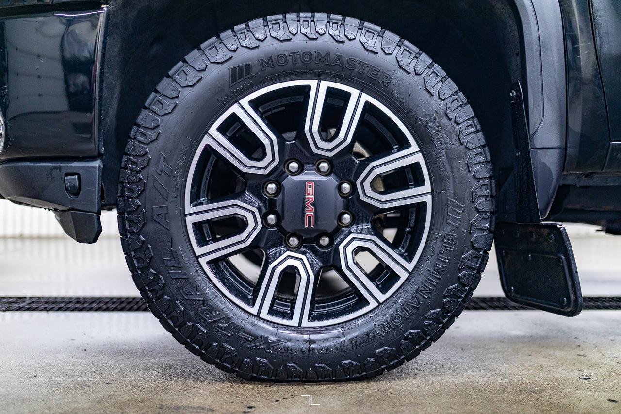 2023 GMC Sierra 2500HD 4x4 Crew Cab AT4 Diesel Leather Roof Nav BCam Red Deer AB